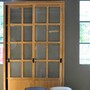 Grosser Vitrinenschrank Morelia aus massivem Teakholz. Morelia mit Schiebetueren und Milchglas Scheiben, MOEBEL KOLONIE Muenchen, Manufaktur und Design