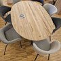 Vogelperspektive, ovale Teak massiv Tischplatte, aus der MOEBEL KOLONIE Manufaktur, mit sieben Polsterstuehlen in modernem Designs
